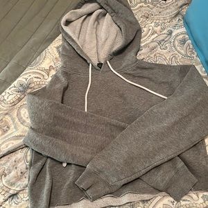 It’s a gray a crop top hoodie